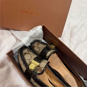 Coach Women's Black and Tan Loafers with Gold Accents